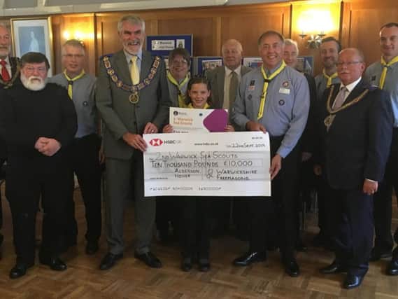 Members of the Warwickshire Freemasons presenting a cheque to the 2nd Warwick Sea Scouts. Photo submitted.