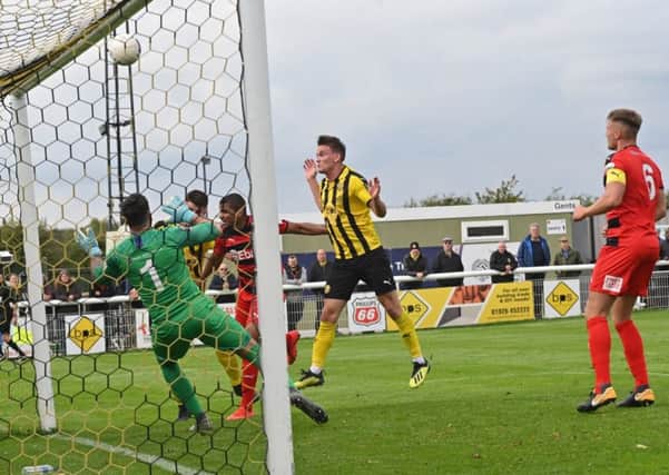 Connor Taylor fails to find the target from close range. Pictures: Lou Smith