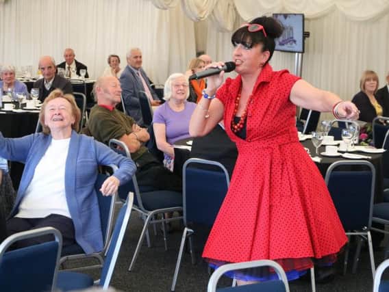 Performer Ruby Ann Sings entertaining Warwick District Council tenants and guests.