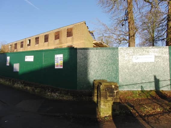 Demolition work is currently taking place at the old police station in Warwick. Photo by Geoff Ousbey.
