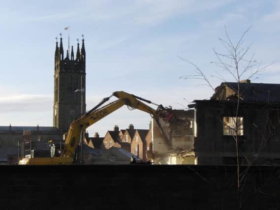 The demolition taking place at the old police station in Warwick. Photo by Geoff Ousbey