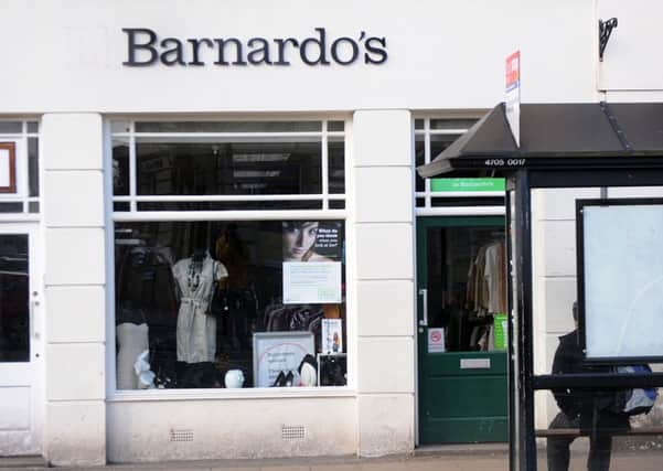 MHLC-12-03-13 Barnados appeal Mar52Barnado's charity shop appealing against an enforcement notice issued by Warwick District Council ordering its Leamington shop to take down a sign as it had been put up without listed building consent.