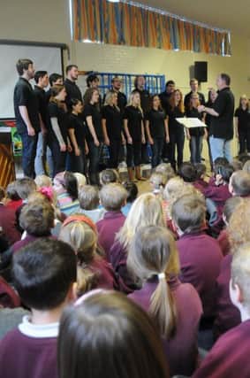 A student choir from the USA was visiting St Paul's Primary School in Leamington on Thursday and performed in the assembly.
MHLC-07-03-13 Choir visiting Mar41