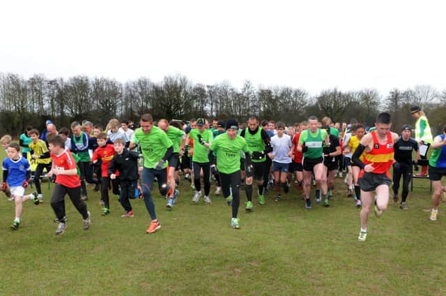 Ryan Kenny, far right, leads off runners in the 100th edition of the Leamington parkrun at Newbold Comyn last Saturday.
MHLC-16-03-13 Parkrun 100 Mar67