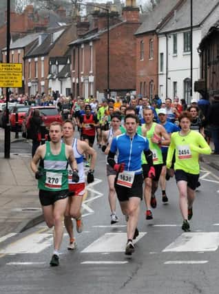 Richard Simkiss (270) leads out the runners at the Warwick Half Marathon with Andrew Savery tucked in behind.