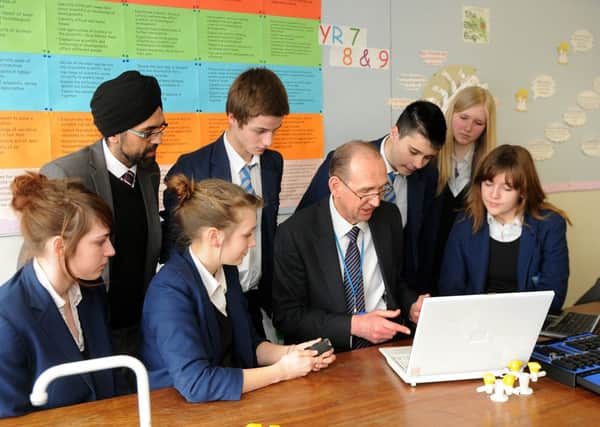 MHLC-14-03-13 Stephen Bold Mar58
Campion School, had a visit from,Dr Stephen Bold, managing director at Sharp Industries, Oxford,Demonstrating LCD display Monitor in 3D to the year eleven pupils and deputy head Mr  Jassa Panesar as  part of National Engineering Week.