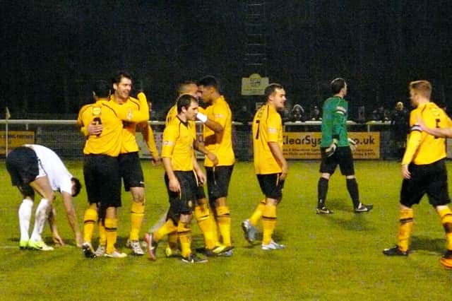 Brakes players celebrate after Stefan Moores goal killed off the challenge of Bedford Town. Picture: Sally Ellis