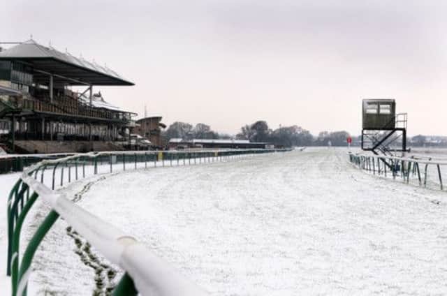 The scene at Warwick racecourse last weekend. The course is due to host its first flat meeting of 2013 on Monday. MHLC-25-03-13 Racecourse Snow Apr7