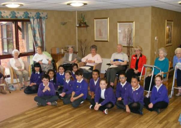 Residents at Cubbington Mill care home are entertained by poetry readings by pupils from Our Lady and St Teresa's Primary School.