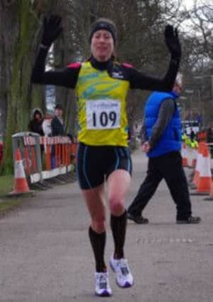 Sue Harrison wins the Perth 50k.