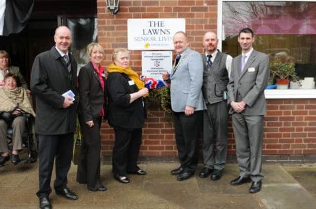 MHLC-04-04-13 Twinning Apr16
The Lawns Care home held a twinning event with its German neighbours,unveiling of the plaque to commemorate the event.
Pictured from the left, Geoff Pride (senior marketing manager),Tracy-Ann-Margrave (administrator),Diana Lanyon (residents receptionist),Councillor Adrian Barton-Town Mayor of Whitnash,Paul Gaskell (home manager), and Peter Brooker (regional care manager)
