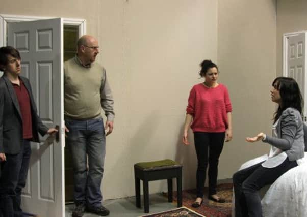 Darryl Hughes, Mike Jones, Rachel Johns, Lydia Ward (seated) and Liam Hogan-Birse in the Priory Theatre's production of If I Were You.