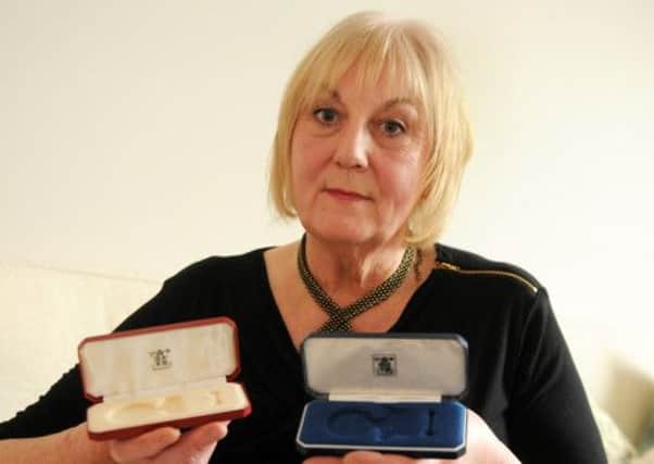 MHLC-17-04-13 Missing medals Apr64 
Sadie Dobson is appealing for people to come forward who may be able to help track down burglars who stole her husband Brian's medals. There is one long-service police medal and one British Empire Medal for his services to the Whitnash community.
Brian Dobson was Leamington's first community police officer, who retired in 1993 and died in 2006. A road in Whitnash, Dobson Lane, was named after him because he was so well-respected in the town.