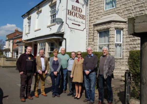 Campaigners who want the Red House pub to be reopened (L-R):John Griffiths, Michael Cox-Mahon, Caroline Pack, John Crossling, Anthony Dwyer, Linda Cox-Mahon, Jim Minnis, Alan Bartlett.