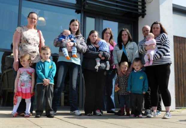 MHLC-25-04-13 children Apr88 
Sarah Compton (far right)  and other Mums and dads who attend the Lillington Children's Centre, are angry about the loss of play sessions and the 40 per cent back in funding planned for next year.