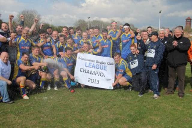 Kenilworth celebrate their Midlands Two West (South) title at Bedworth.