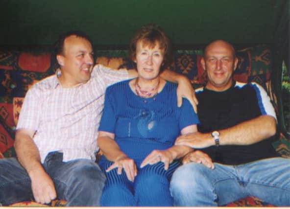 Peter Squires (left) with his mother Glenys and brother Andrew.