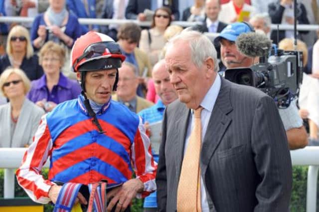 Trainer Richard Hannon, seen here with Richard Hughes, has five entries on the card for Warwicks Bank Holiday Family Fun Day meeting.