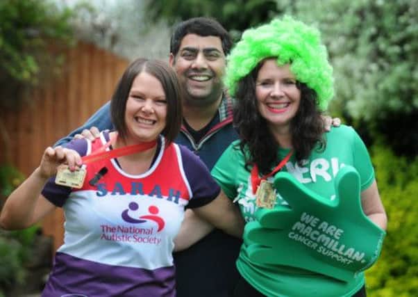 MHLC-30-04-13 Fundraisers Apr98
 Pictured from left,Sarah Williams and Catherine Thompson  have raised thousands of pounds for Macmillan and the Autistic Society by running the London Marathon. Catherine has organised a night with motivational speaker Richard McCann which will also raise funds for The Sunny Dhillon Memorial Day. also pictured Gurinder Gkag (centre sunny's uncle)