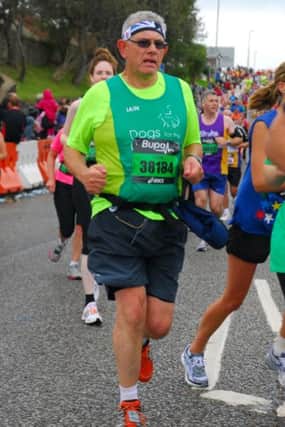 Iain Wilson of Southam 2000 Rotary club running one of his 12 half marathons