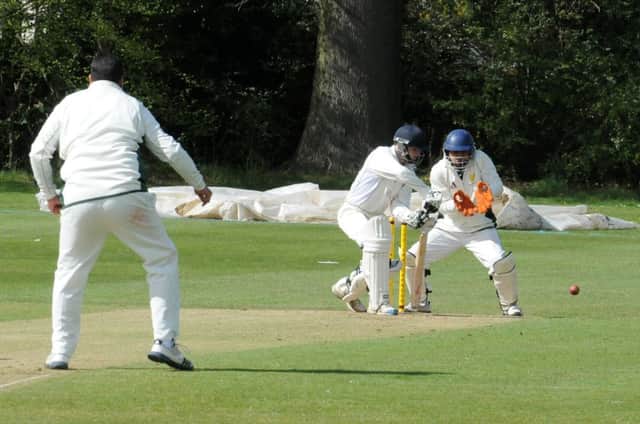 David Bailey pushes the ball away on the off-side on his way to making 53 for Leamington 1sts. MHLC-04-05-13 Leamington CC May16