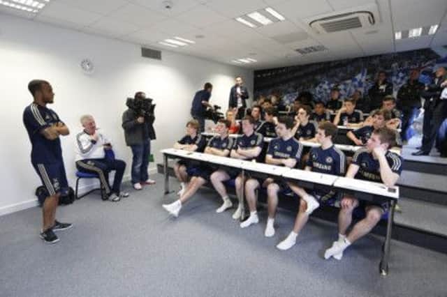 Jordan King, second row far right, gets an insight into life at Chelsea.