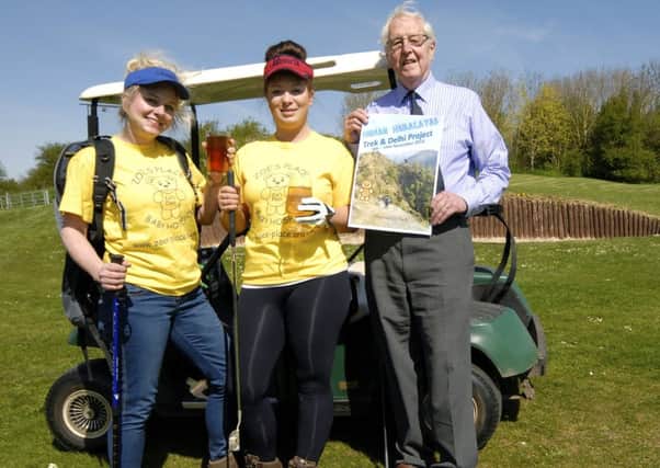 Prof Jack Scarisbrick with daughter and granddaughter, Sarah and Felicity Miller teeing off a year of fundraising.