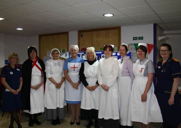 Warwick Hospital's senior nursing team dressed in period nursing uniforms.
