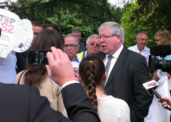 Transport Secretary Patrick McLoughlin speaks to Stop HS2 campaigners outside Jubilee House in Kenilworth on Monday after announcing £5 million government funding for the £11.3 million project to build a  train station in the town.