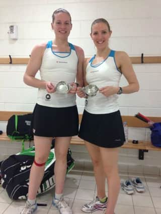 Laura Massaro and Sarah-Jane Perry show off their trophies.