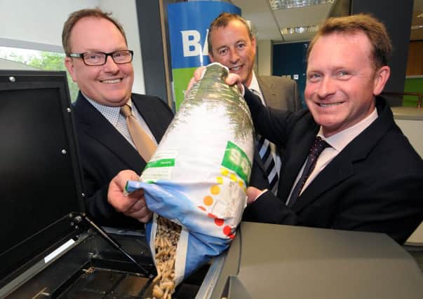 MHLC 30-05-13 Baxi Jun10
Chris White MP visiting Baxi in Warwick, Looking at the new age of  of Biomass boilers burn naturally based biomass fuels such as wood pellets and even grain or corn. 
Pictured, Paul Hardy is the Managing Director of Residential Boilers and Baxi Commercial and Andrew Keating is UK Marketing Director at Baxi