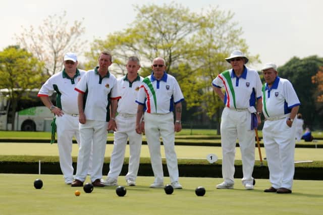 Players from Royal Leamington Spa and Blaina await the final bowls of the end during their friendly encounter at Victoria Park. MHLC 31-05-13 Bowls at Victoria Jun15