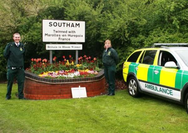 Area Manager Martyn Scott pictured with ECP Mandy Morrice. Picture courtesy of West Midlands Ambulance Service.