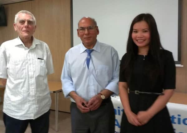 Zoya Phan with Gian Clare and Andrew Watt of the Warwick district branch of the United Nations Association.