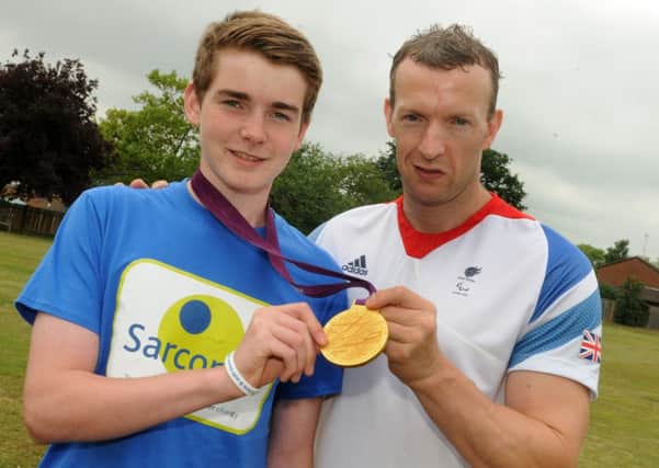 MHLC-10-07-13 Medallist Jul41 
Paralympic gold medallist Richard Whitehead MBE was speaking at Arnold Lodge Schools prizegiving and meet up with  Pupil Harry McKenna who is running to raise money for Sarcoma UK.