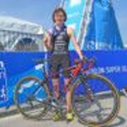 Triathlete Megan McDonald at the finish line of the Youth Elite Triathlon British Championships in Liverpool, where she retained her title.