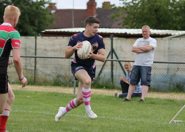 Royals winger Ian Maull on his way to scoring a try. Picture: Tim Nunan