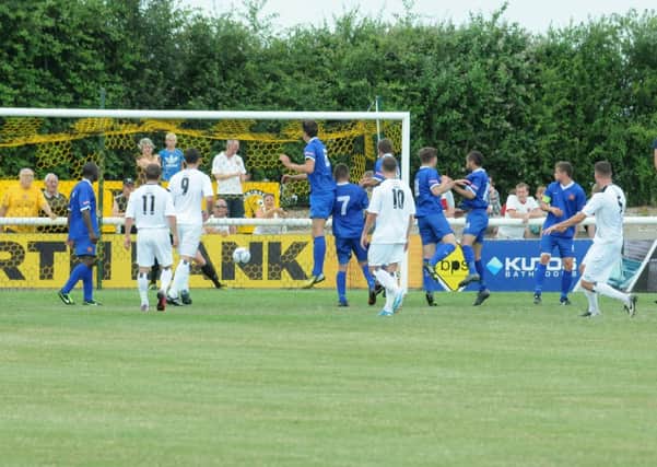 Liam Daly fires his free-kick through the wall to open the scoring for Brakes. MHLC-20-07-13 Brakes FC Jul161