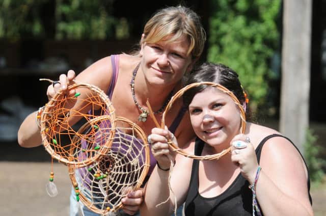 MHLC-17-07-13 Dreamcatchers Jul1
Create your own dream catcher using natural materials including willow, string and wooden beads. 
Pictured,Laura Hood (running the dream catcher workshop) and Yelena Jeffery .