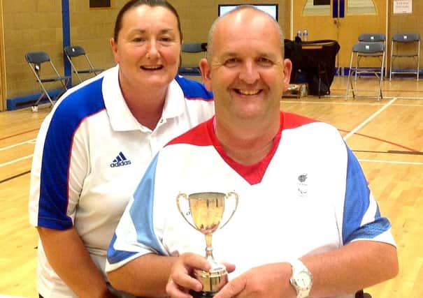 Nigel Murray shows off the his tenth British Championship trophy with partner Sylvia.