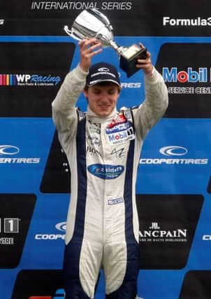Jordan King celebrates his victory at Spa-Francorchamps.