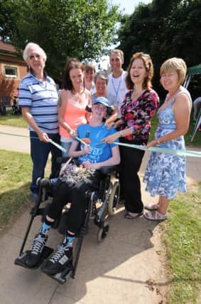 Part of the new garden was opened by Michael Spowart from Campion Ward. He is pictured with Rod Mansell (Chairman of The League of Friends), his Mother Kate O'Driscoll, Susie Fenton, Jean Johns (Hotel Service Oporations Manager), David Wolstencroft, Catherine Wickens (Project Leader) and Barbara Chambers. 
MHLC-02-08-13 Flower party Aug5
