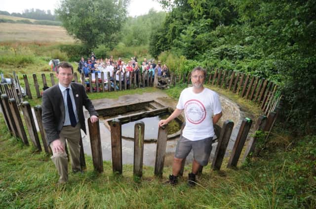 Southam residents held a protest picnic at the historic Holy Well on Friday against plans for housing on the adjacent Holywell Field. MP Jeremy Wright joined them and is seen with action group Chairman Gareth Oubridge.
MHLC-16-08-13 Holy Well protest AUG46