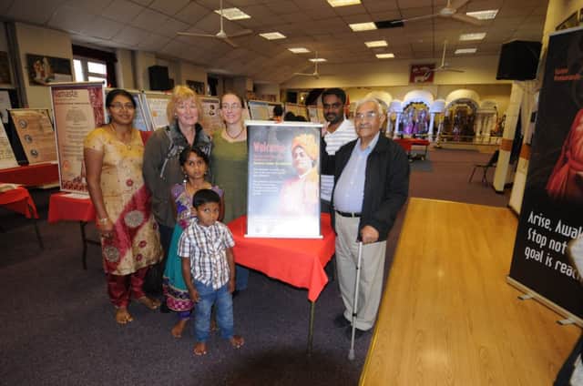 The Shree Krishna Mandir temple is holding an exhibition about ancient Indian civilisation. Pictured with Chandra Dave are Linda Chery, Sonia Mehra and the Konda family.
MHLC-17-08-13 Hindu exhibition Aug21