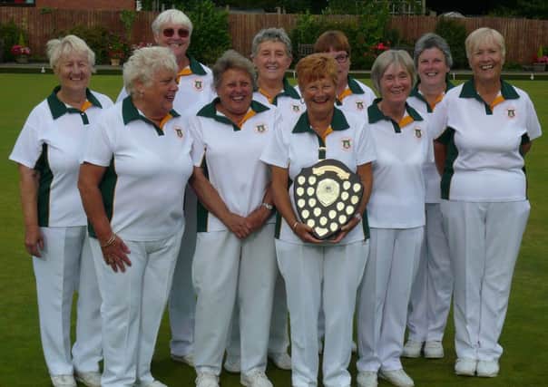Southam United Ladies show off the Warwickshire Top Club trophy after successfully defending their title.