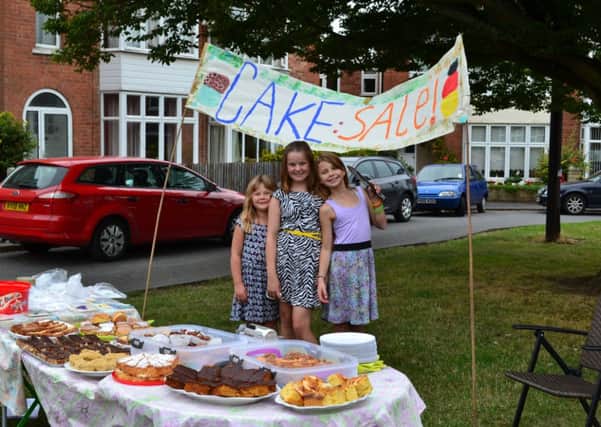 Jessica Franklin (12), Evie Griffiths (10) and Milly Griffiths (6) held a cake sale to raise money for the Warwickshire and Northamptonshire Air Ambulance.