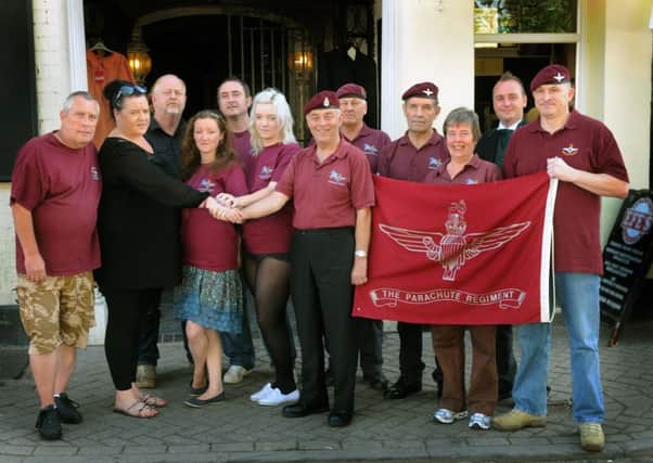 MHLC-04-09-13 Para's fund Sep14 

Publicans Joyce and Jeff Doherty (parents of Pt Jeff Doherty)  have donated £500 and undertaker Stephen McDonald of JohnTaylors funerals (£700 donation)  to the Lonnie Downes, on behlf of the ( Bedworth Para Association) and Mike's daughters Jade and Becky Halliwell and members of the Bedworth Para Association.