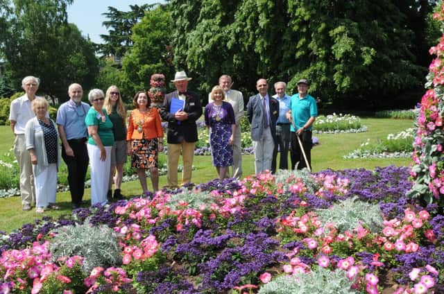 MHLC-11-07-13 Bloom Judges Jul03 
Judges Mark Wlitshire and Roger Bache (vice chaiman of heart of England in Bloom) in Jephson Gardens Leamington,Judging the Bloom Competition, also picture,Enid Simms (chair of Leamington in bloom  committee),Cllr Richard Davies (chair of Warwick District Council ),Cllr Judith Clarke (Mayor of Royal Leamington Spa),Jon Holmes ( Parks manager), and Various members of the  Leamington in bloom  committee.