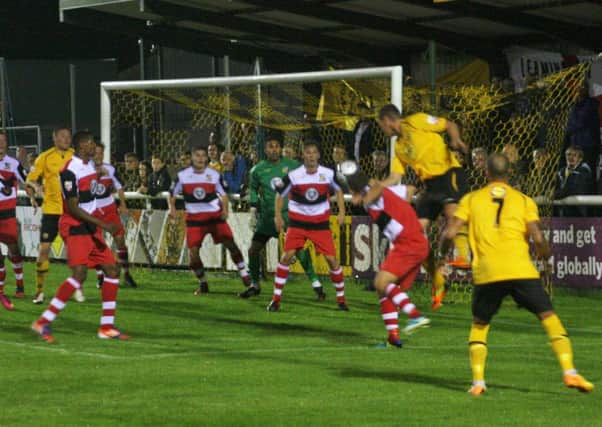 Laim Daly makes his presence felt at the back post. Picture: Sally Ellis