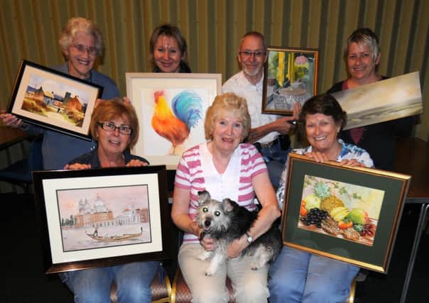 Kineton Art Group are holding an exhibition and sale in October. Group members Grace Foot, Joan Payn, Kathryn Wickson, Gail O'Dell (with her dog 'Rosie'), Tony Bright and Ann Humphries (Chairman) are pictured with some of their work.
MHLC-23-09-13 Kineton Art Sep20